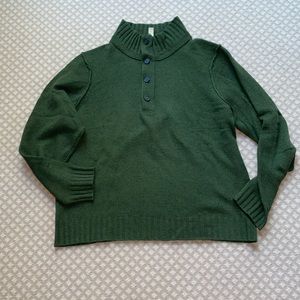 Green wool sweater with beautiful button and zipper detail.